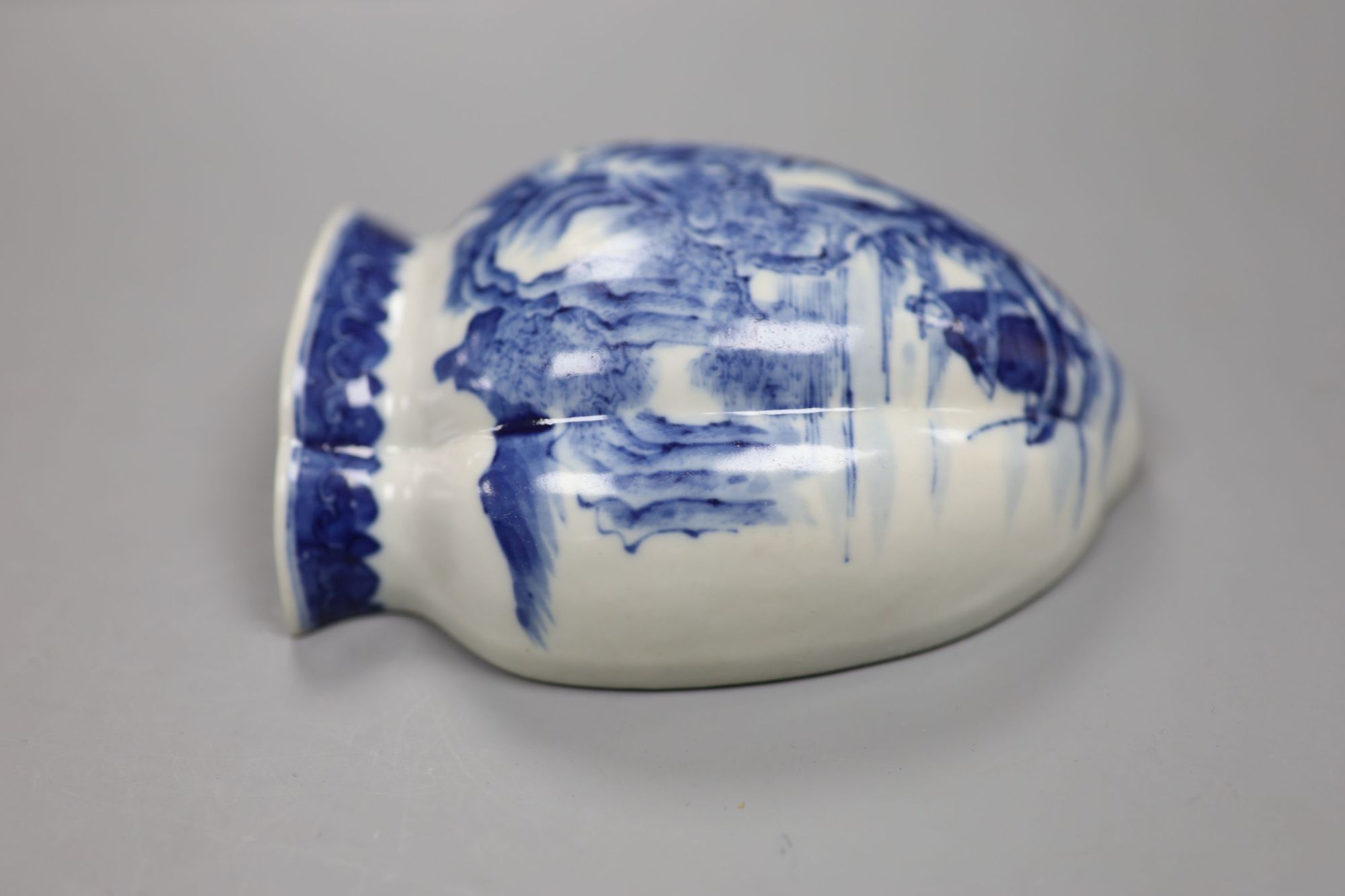 A Chinese blue and white wall pocket, length 12cm